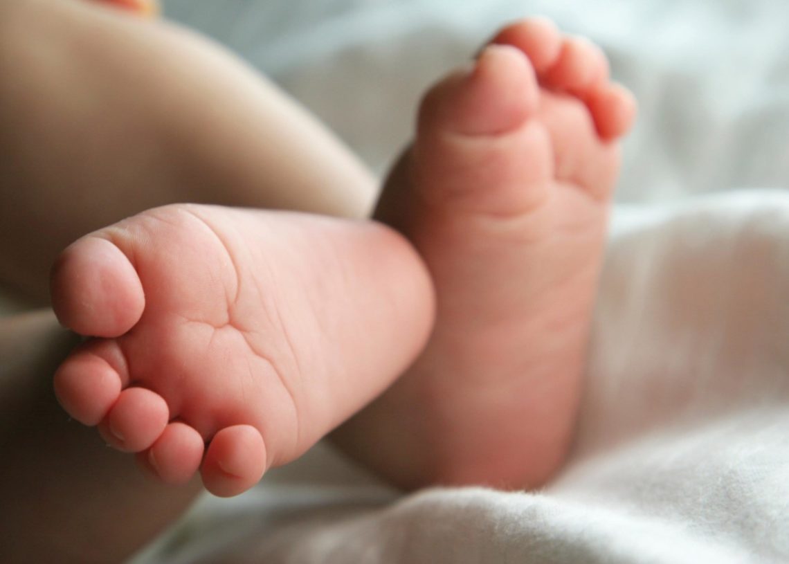 A newborn babys feet